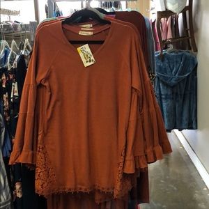 Tunic top- bell sleeves lace cut outs on sides